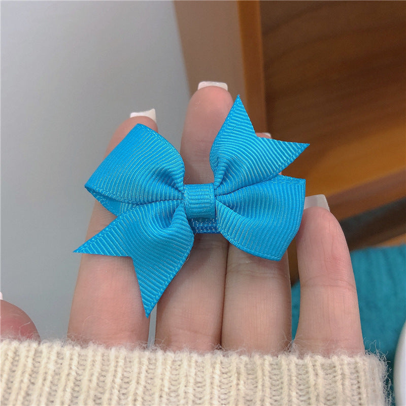 HX-091可愛湖藍色蝴蝶結髮夾~俏皮甜美邊夾少女心軟妹韓國髮飾劉海夾潮HX20211014