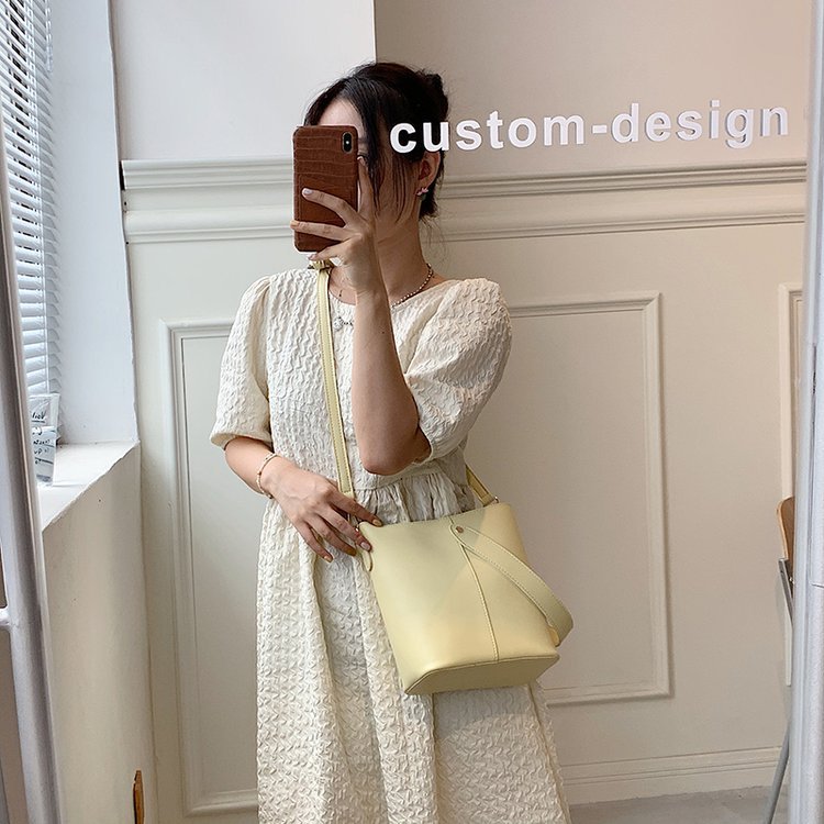 RX6900質感大包包女2021新款潮時尚網紅純色寬肩帶水桶包通勤簡約斜跨包MG20210806